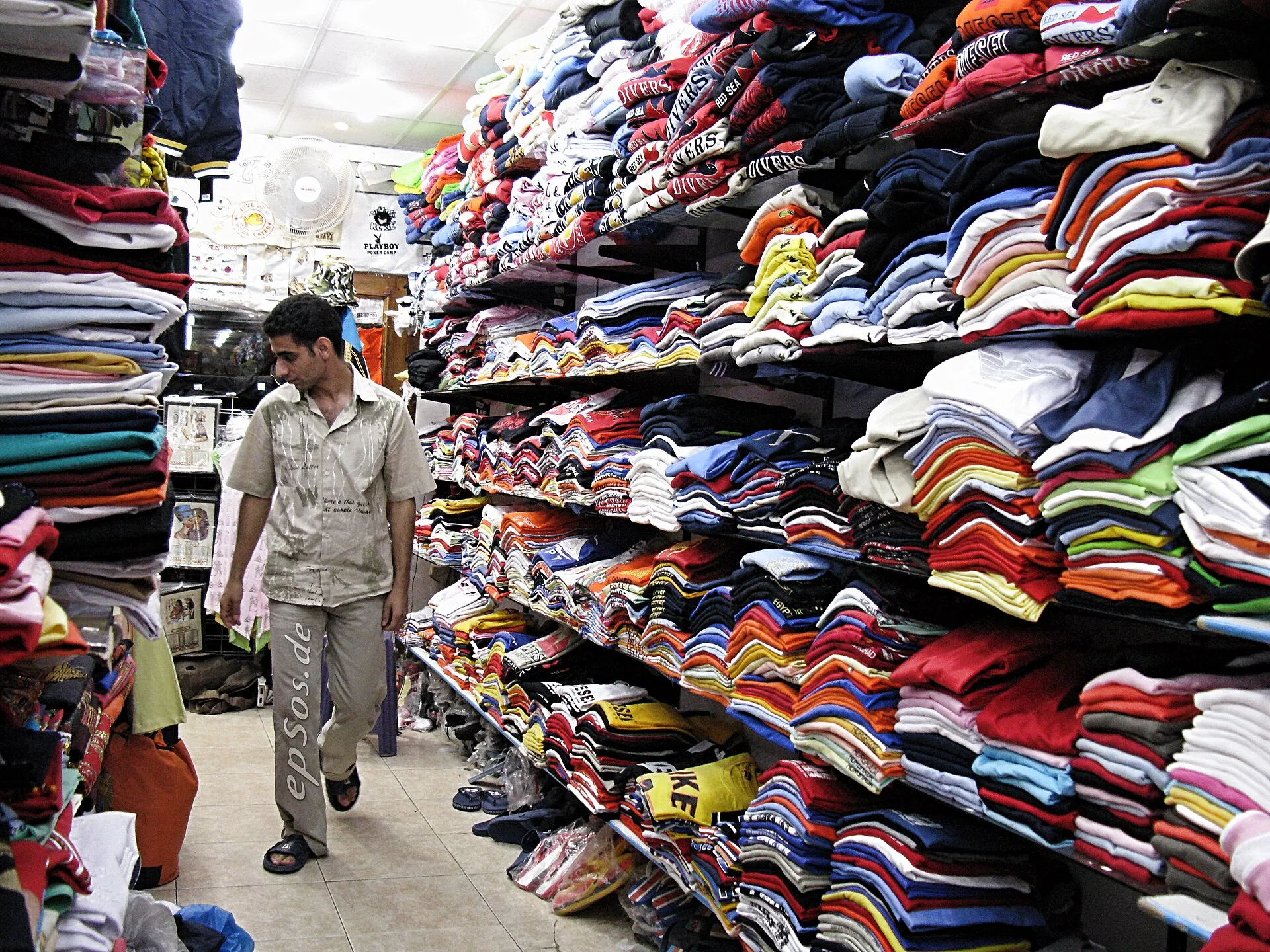 Free picture of casual men shopping for new clothing accessories with male passion for fashion. Esta Hombre is an Arab designer in Egypt who is looking to find clothes for men who love to wear cloth from the wholesale store of urban retail style. He is searching for perfect urban outfits with trendy